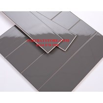 Gạch thẻ 7.5x30 xám đậm bóng phẳng